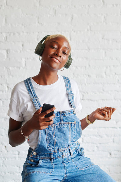 Press Play: 11 Upbeat Spotify Playlists Guaranteed to Boost Your Mood