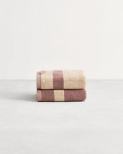 Stack of two cotton terry hand towels in reversible colours lavender & creme - view